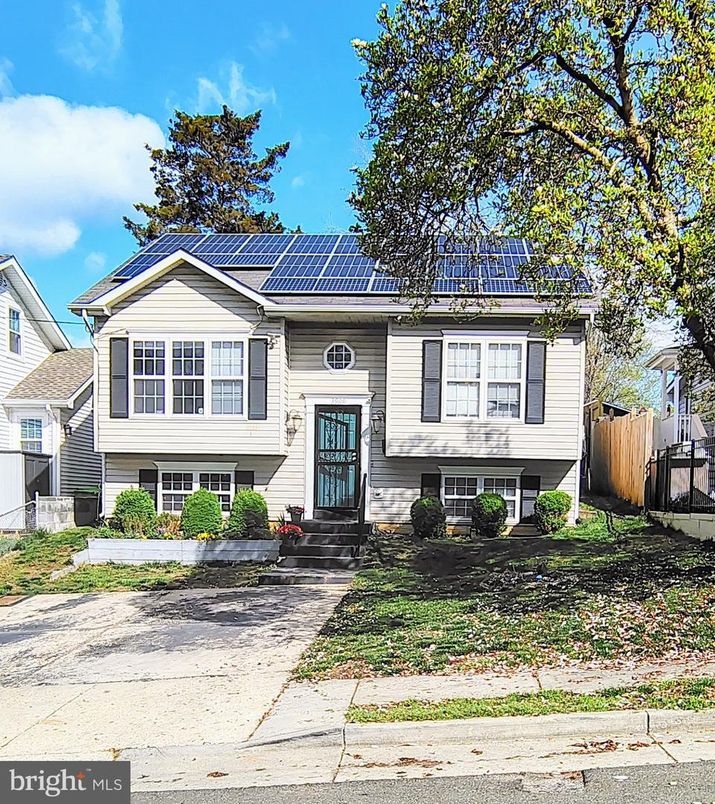 Exterior, Facade, Solar Panels, Raised Ranch