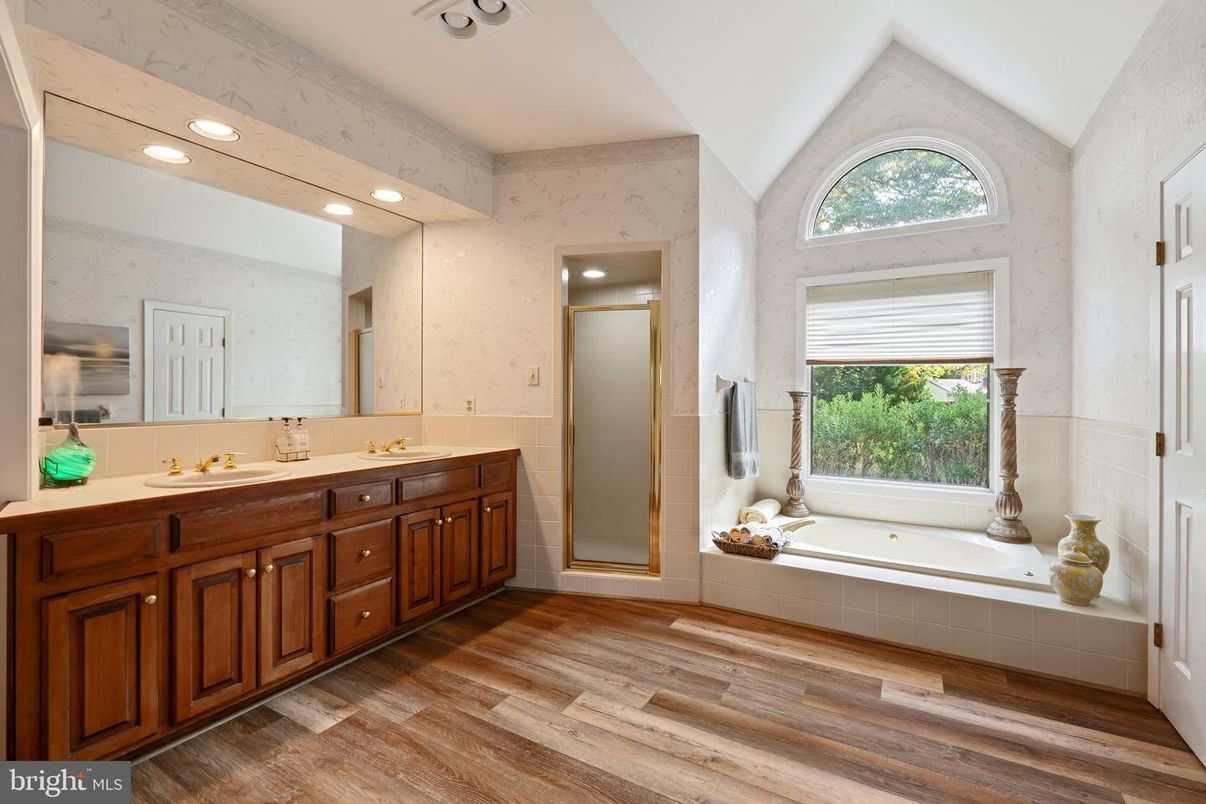 Bathroom, Dual Sink Vanities, Interior, Recessed Lighting, Wood Texture Flooring