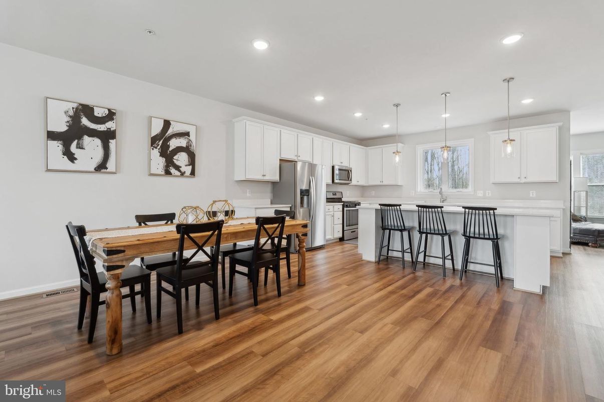 Dining room, Interior, Kitchen, Pendant Lights, Recessed Lighting, Stainless Steel Appliances, Wood Texture Flooring