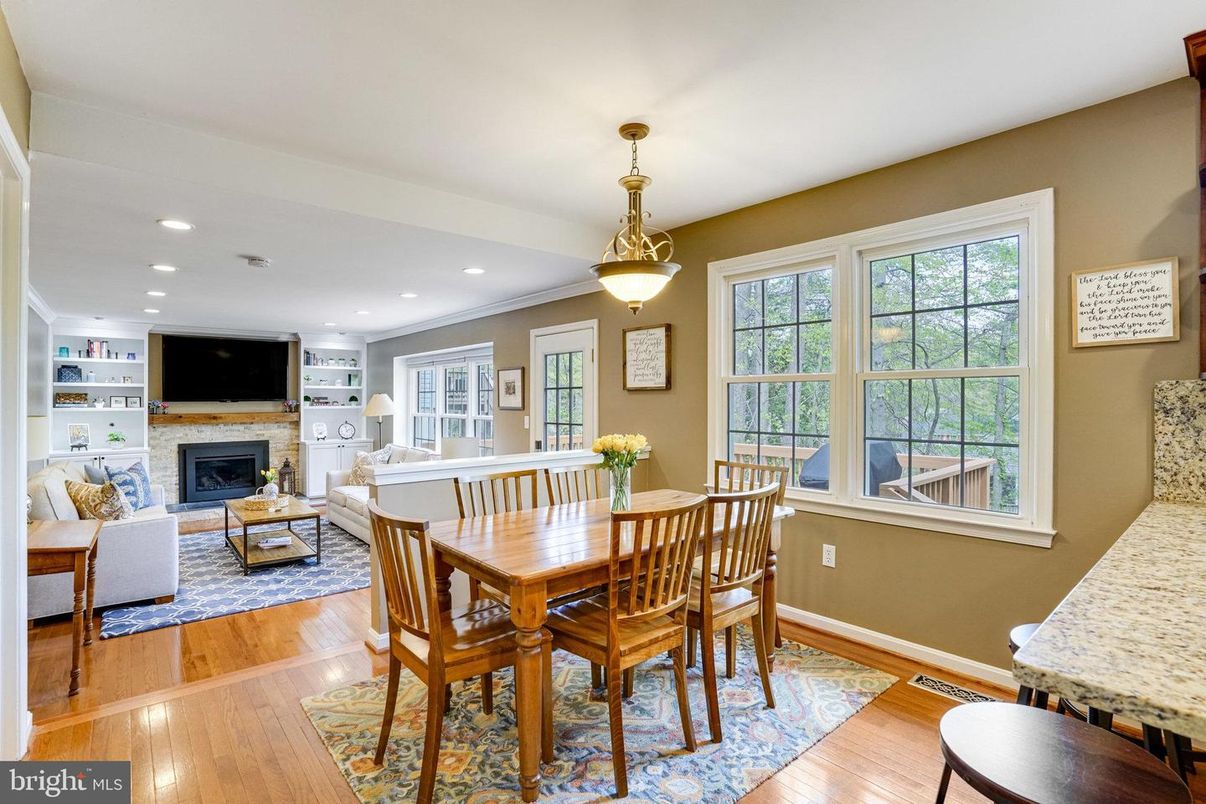 Dining room, Fireplace, Interior, Living room, Pendant Lights, Recessed Lighting, Wood Texture Flooring
