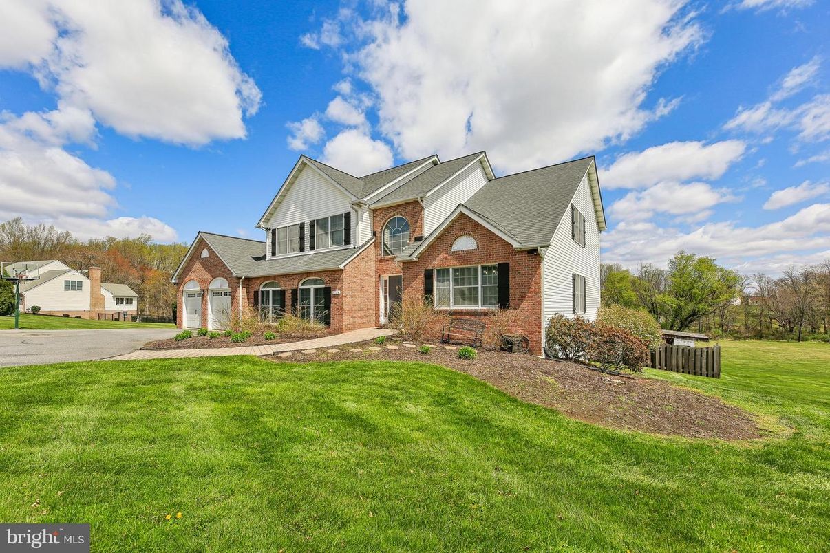 Attached, Backyard, Exterior, Facade, Brick Facade, Brick Traditional