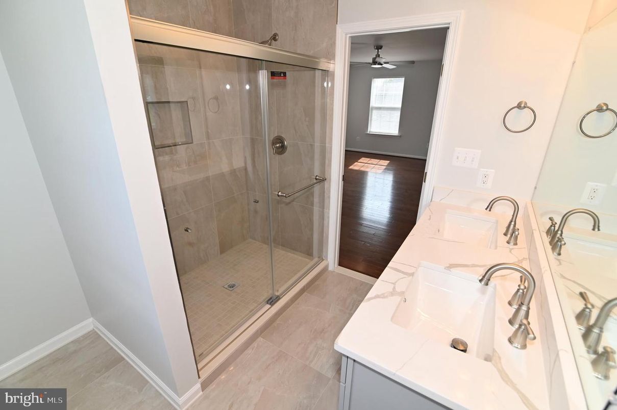 Bathroom, Dual Sink Vanities, Glass Shower, Interior, Wood Texture Flooring