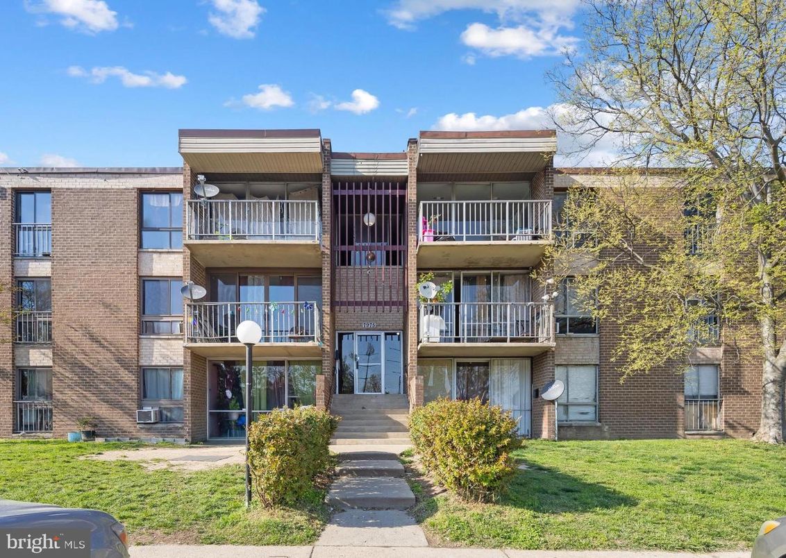 Exterior, Facade, Brick Facade, Condo Building