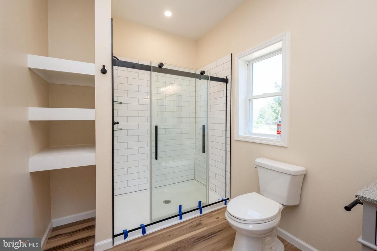 Bathroom, Glass Shower, Interior, Recessed Lighting, Wood Texture Flooring