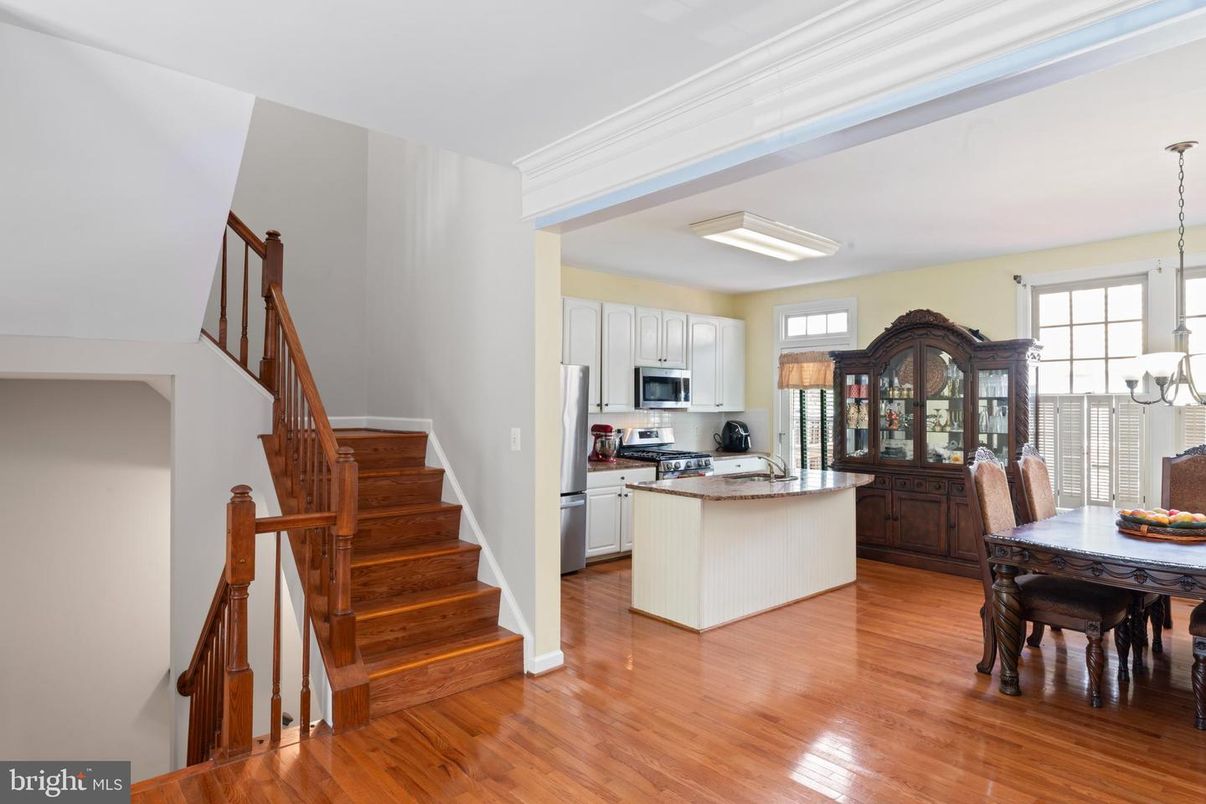 Dining room, Interior, Kitchen, Pendant Lights, Stainless Steel Appliances, Wood Texture Flooring