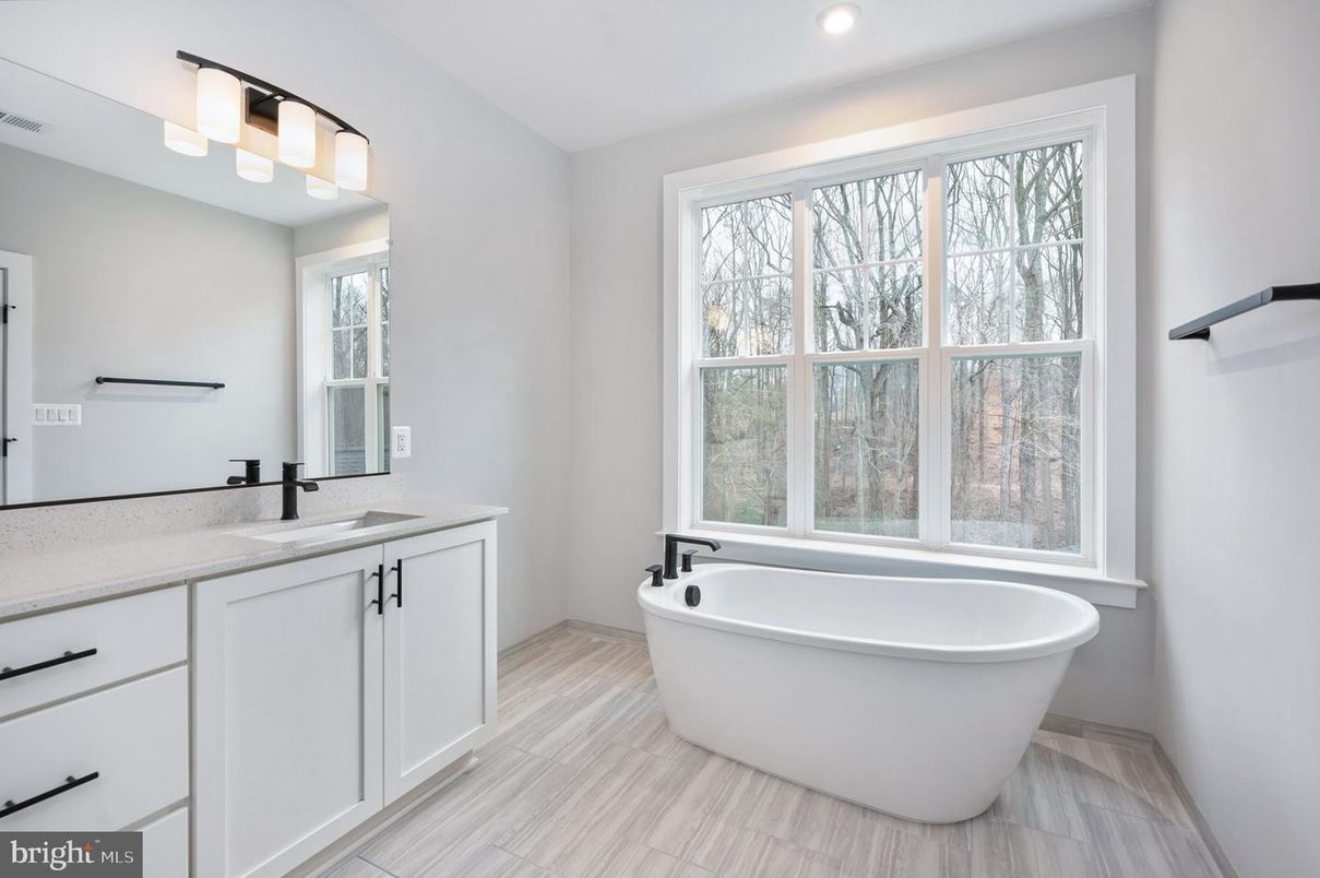 Bathroom, Dual Sink Vanities, Free Standing Baths, Interior, Recessed Lighting, Wood Texture Flooring