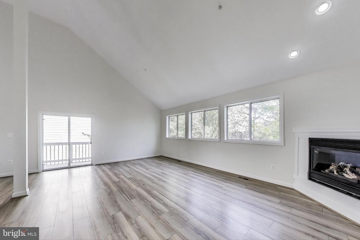 Empty room, Fireplace, Interior, Recessed Lighting, Wood Texture Flooring