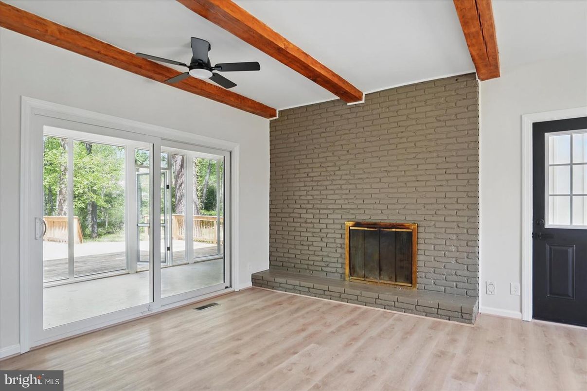 Empty room, Fireplace, Interior, Stone Walls, Wooden Beams, Wood Texture Flooring