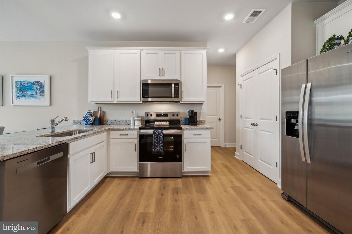 Interior, Kitchen, Recessed Lighting, Stainless Steel Appliances, Wood Texture Flooring