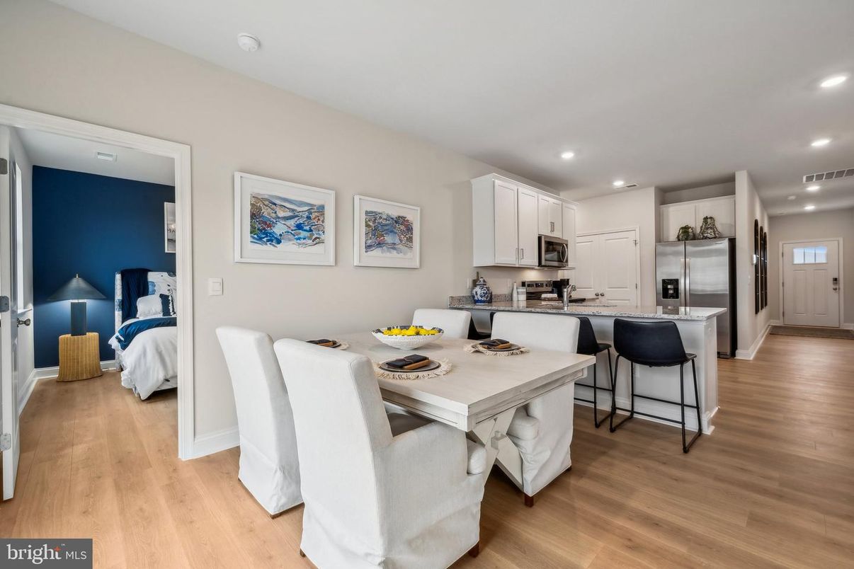 Dining room, Interior, Kitchen, Recessed Lighting, Stainless Steel Appliances, Wood Texture Flooring