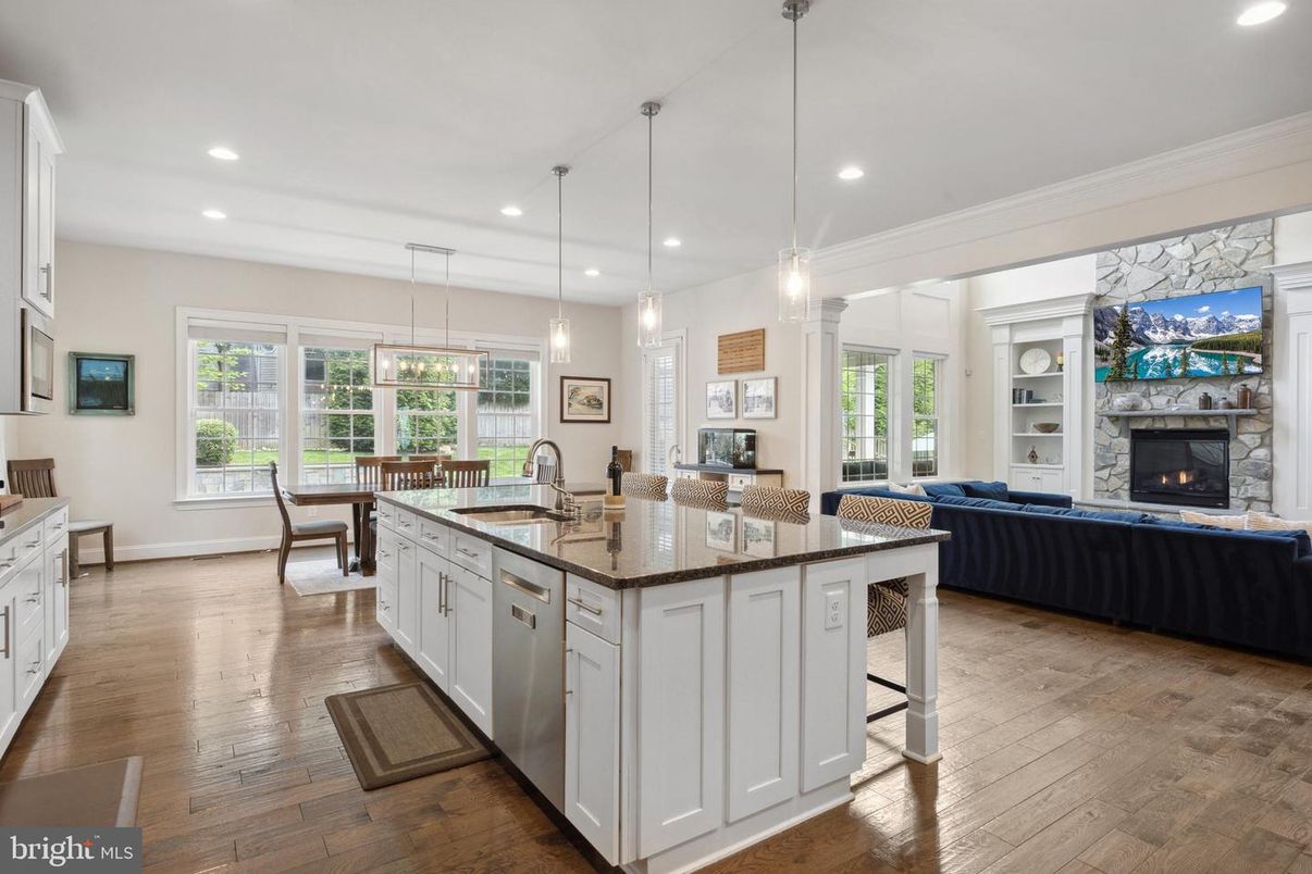 Dining room, Fireplace, Interior, Kitchen, Living room, Pendant Lights, Recessed Lighting, Wood Texture Flooring