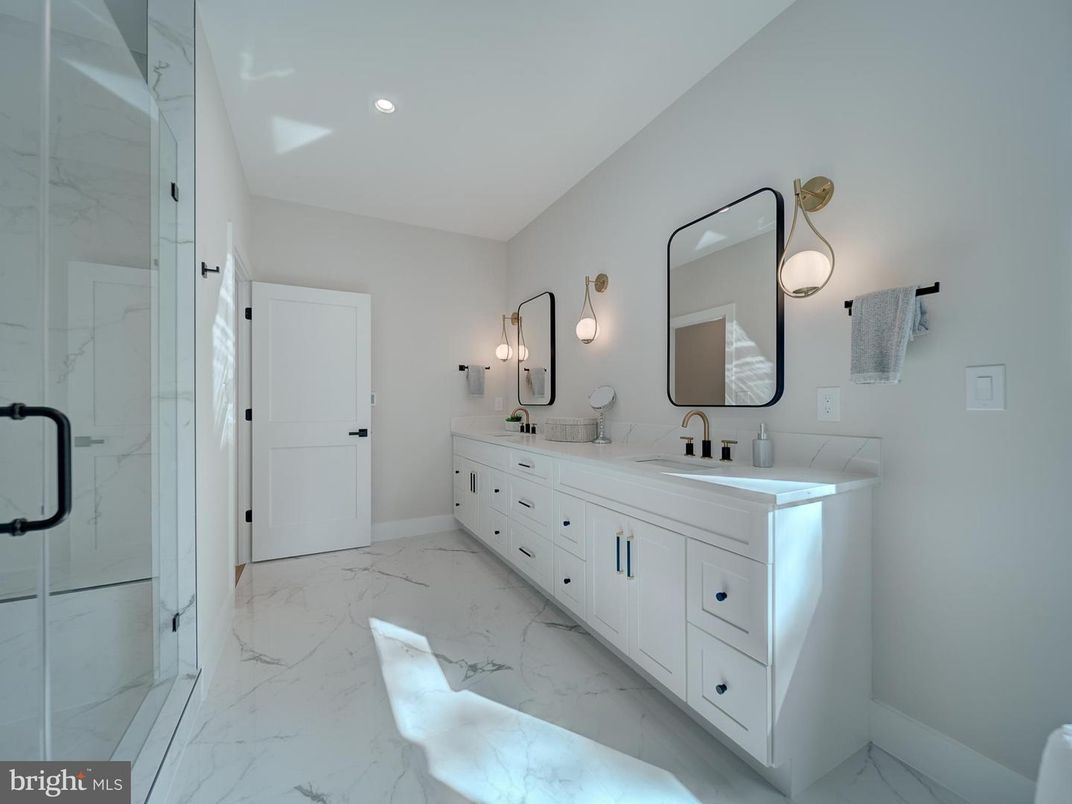 Bathroom, Dual Sink Vanities, Interior, Marble, Marble Walls, Recessed Lighting