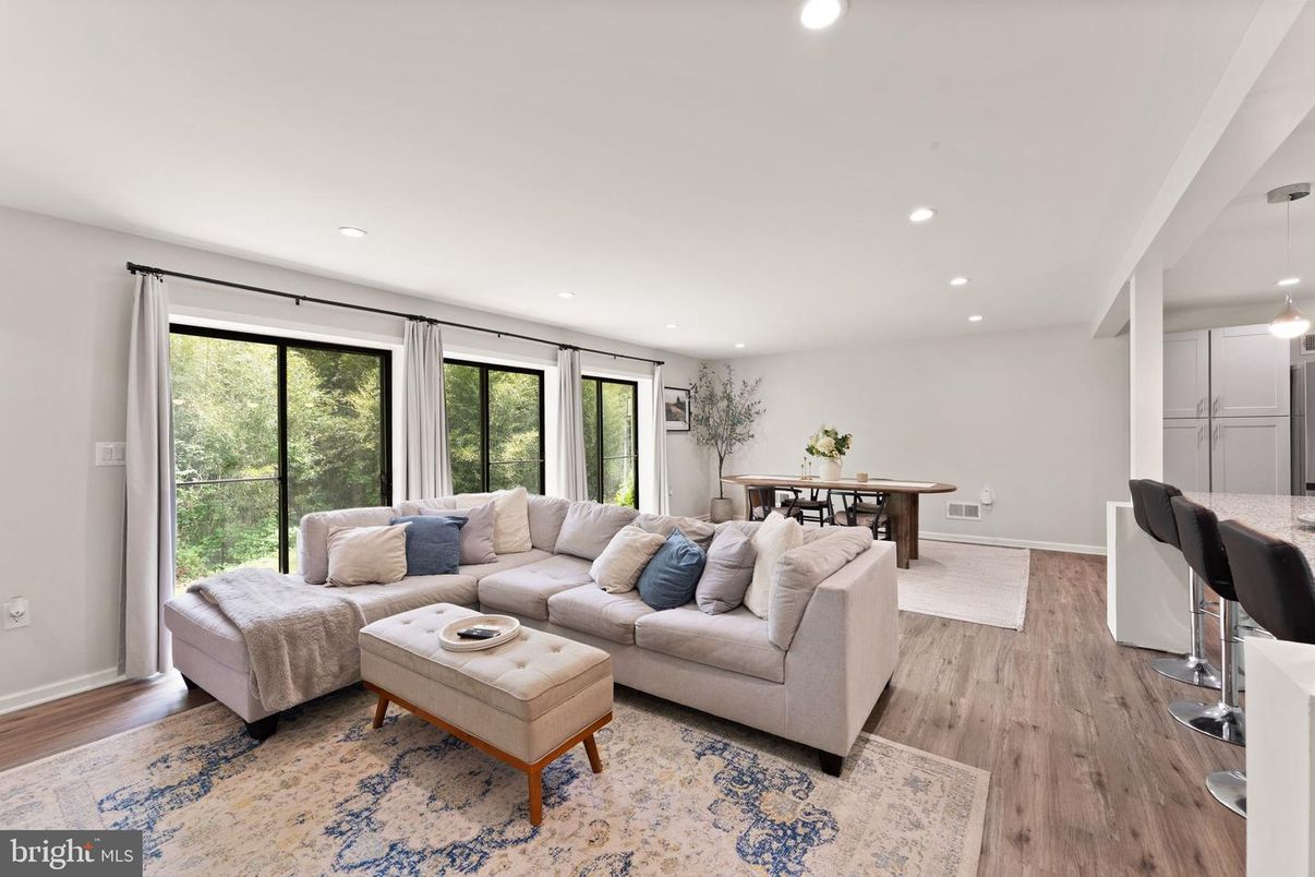 Dining room, Game Room, Interior, Living room, Pendant Lights, Recessed Lighting, Wood Texture Flooring