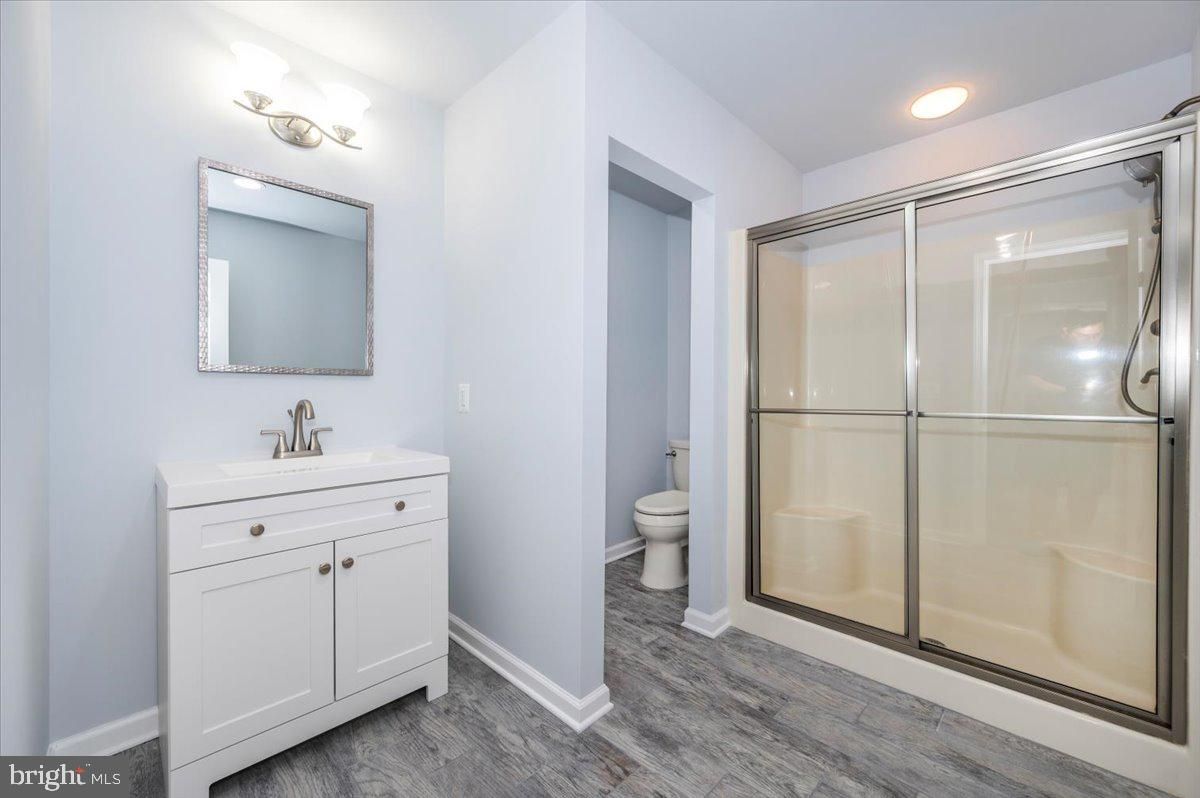 Bathroom, Glass Shower, Interior, Recessed Lighting, Wood Texture Flooring