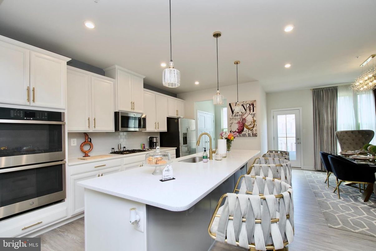 Chandelier, Interior, Kitchen, Pendant Lights, Recessed Lighting, Stainless Steel Appliances, Wood Texture Flooring