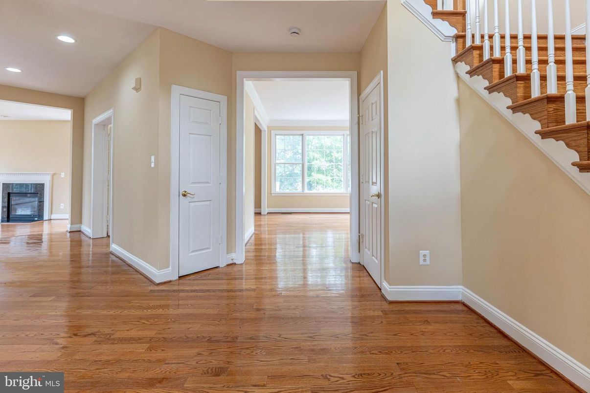 Empty room, Fireplace, Interior, Recessed Lighting, Wood Texture Flooring