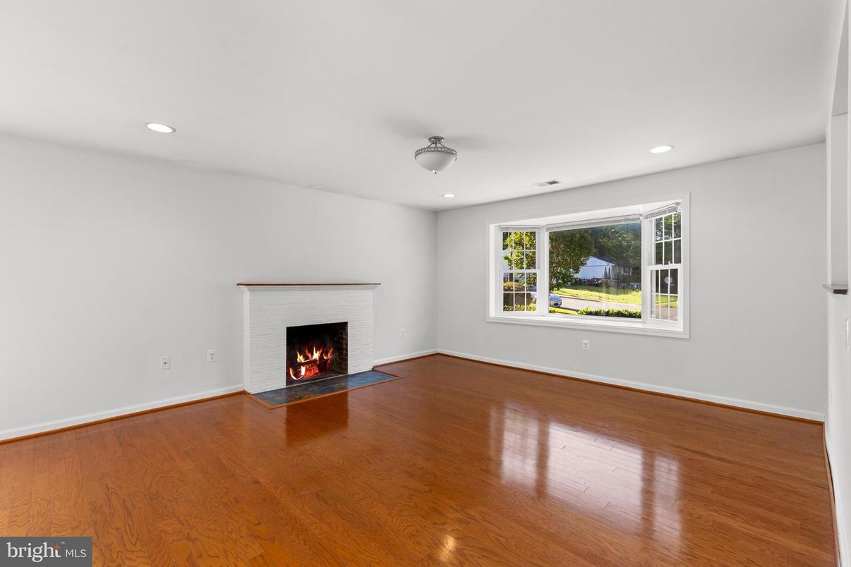 Empty room, Fireplace, Interior, Recessed Lighting, Wood Texture Flooring