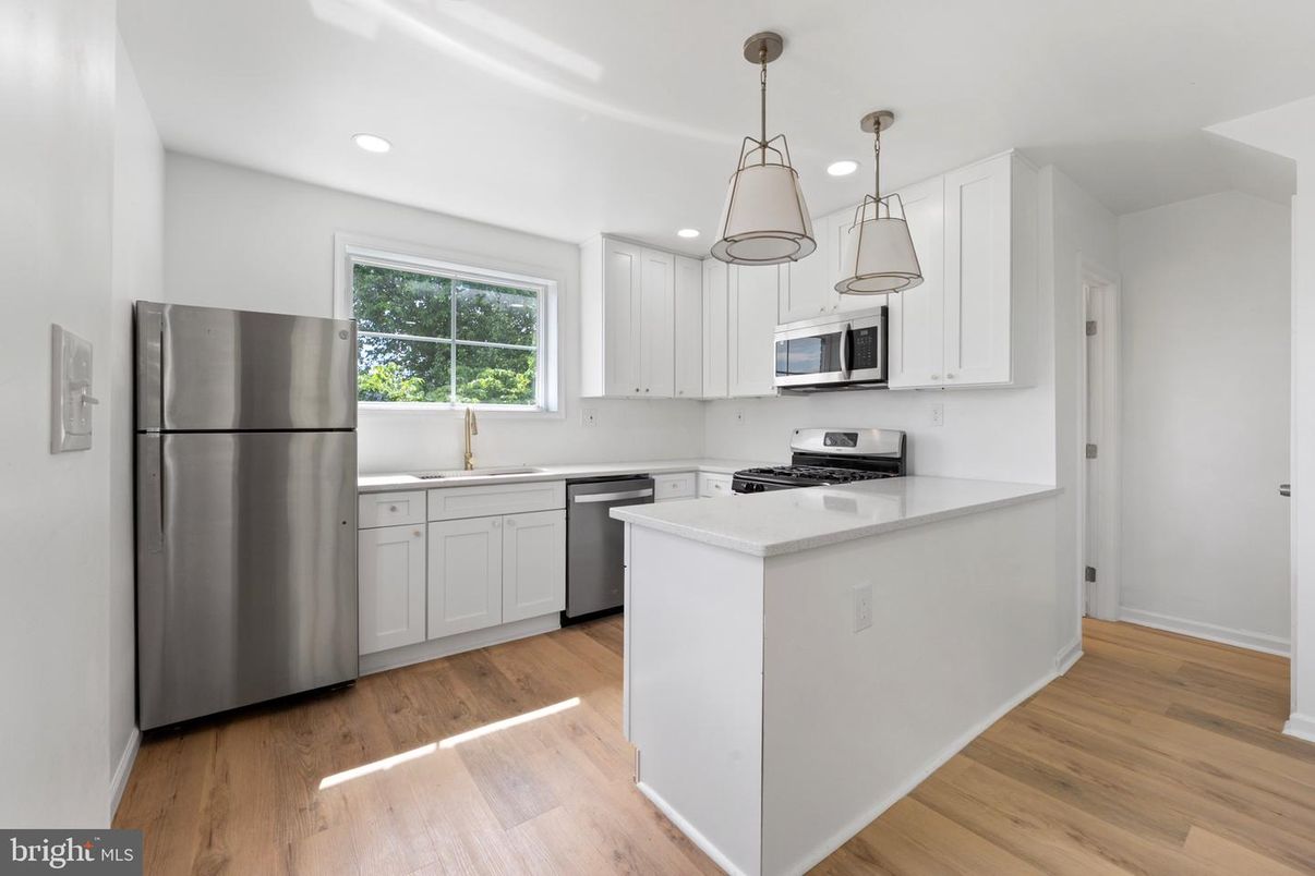 Interior, Kitchen, Pendant Lights, Recessed Lighting, Stainless Steel Appliances, Wood Texture Flooring