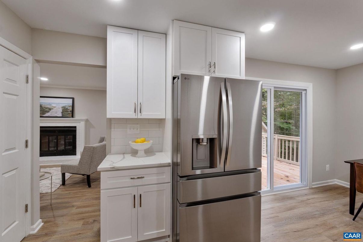Fireplace, Interior, Kitchen, Recessed Lighting, Stainless Steel Appliances, Wood Texture Flooring