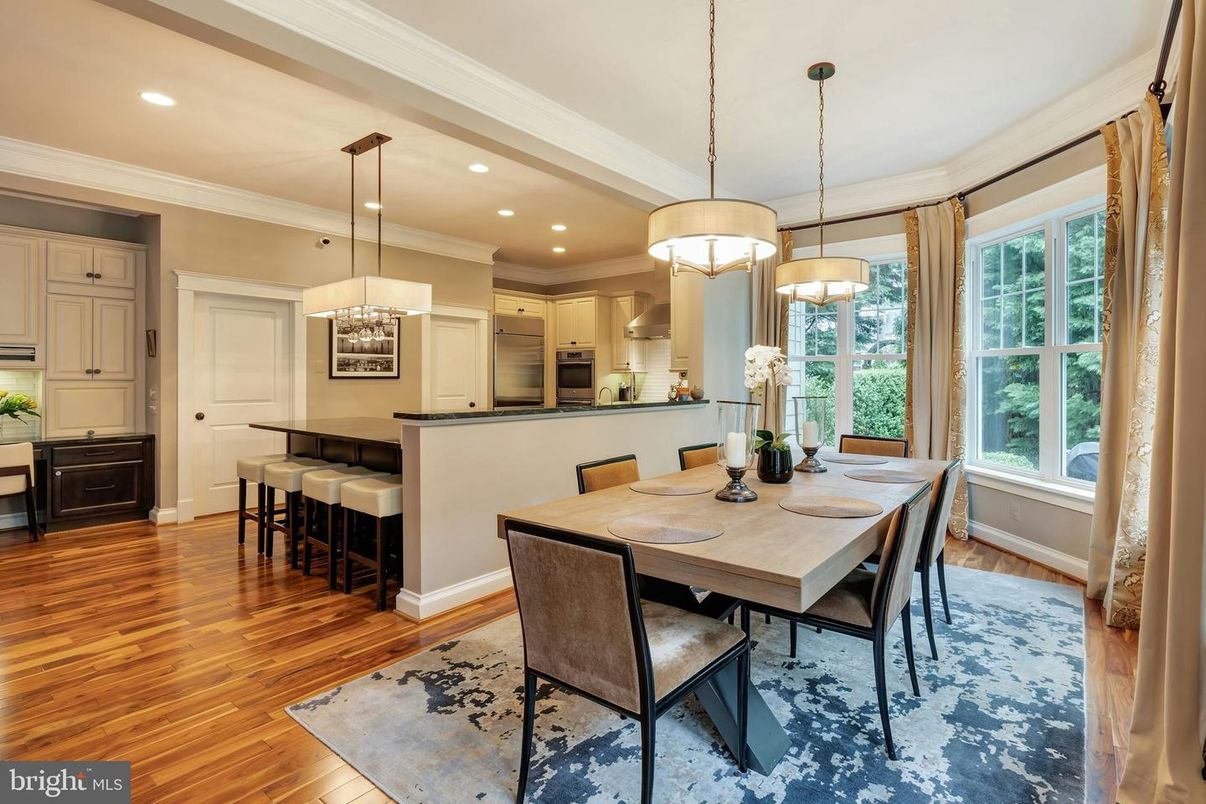 Chandelier, Dining room, Interior, Kitchen, Pendant Lights, Recessed Lighting, Stainless Steel Appliances, Wood Texture Flooring