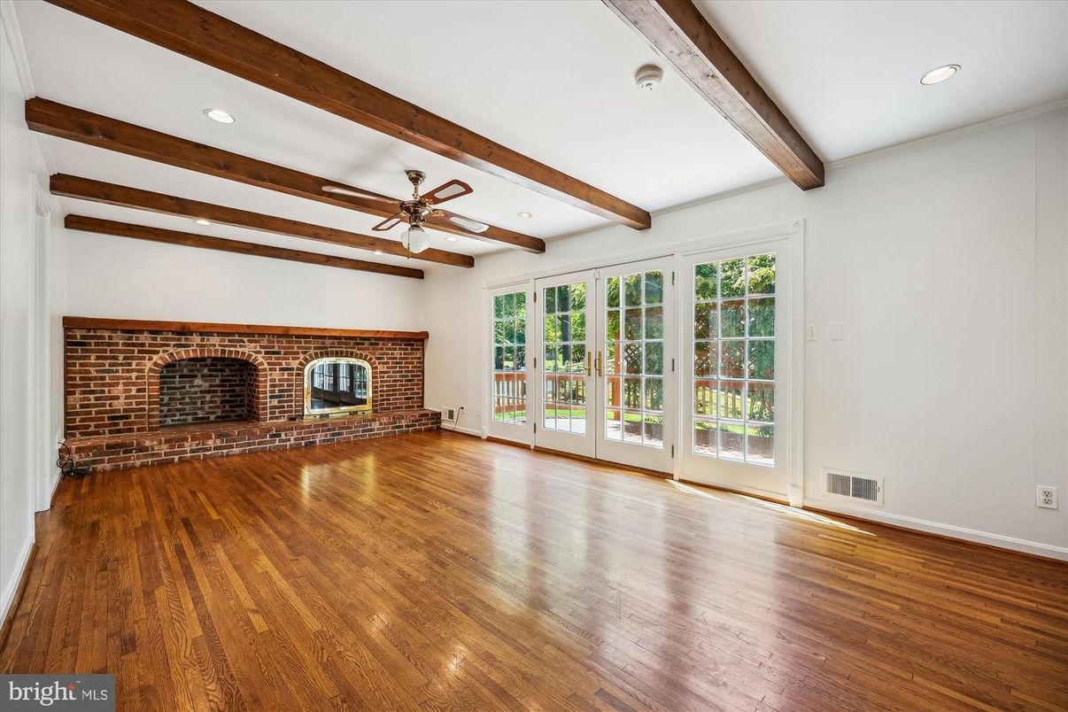 Empty room, Fireplace, Interior, Recessed Lighting, Stone Walls, Wooden Beams, Wood Texture Flooring