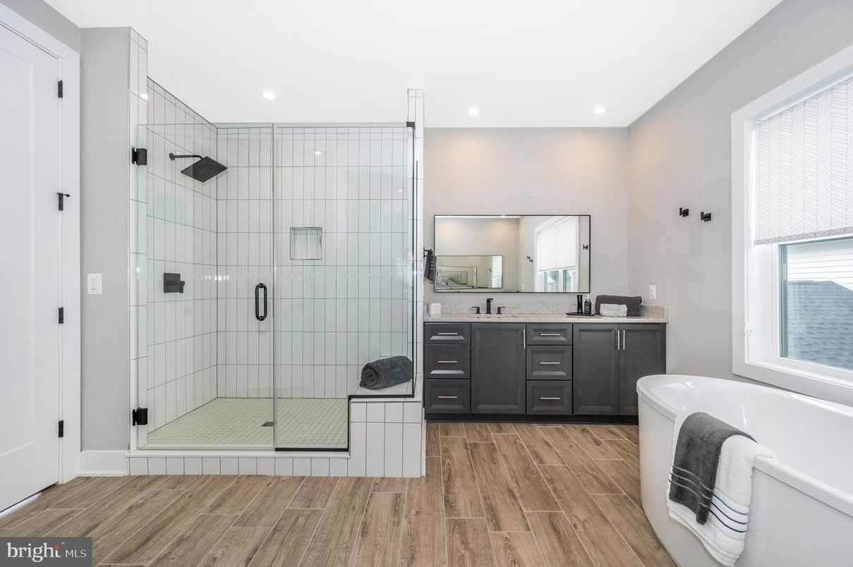 Bathroom, Dual Sink Vanities, Glass Shower, Interior, Recessed Lighting, Wood Texture Flooring