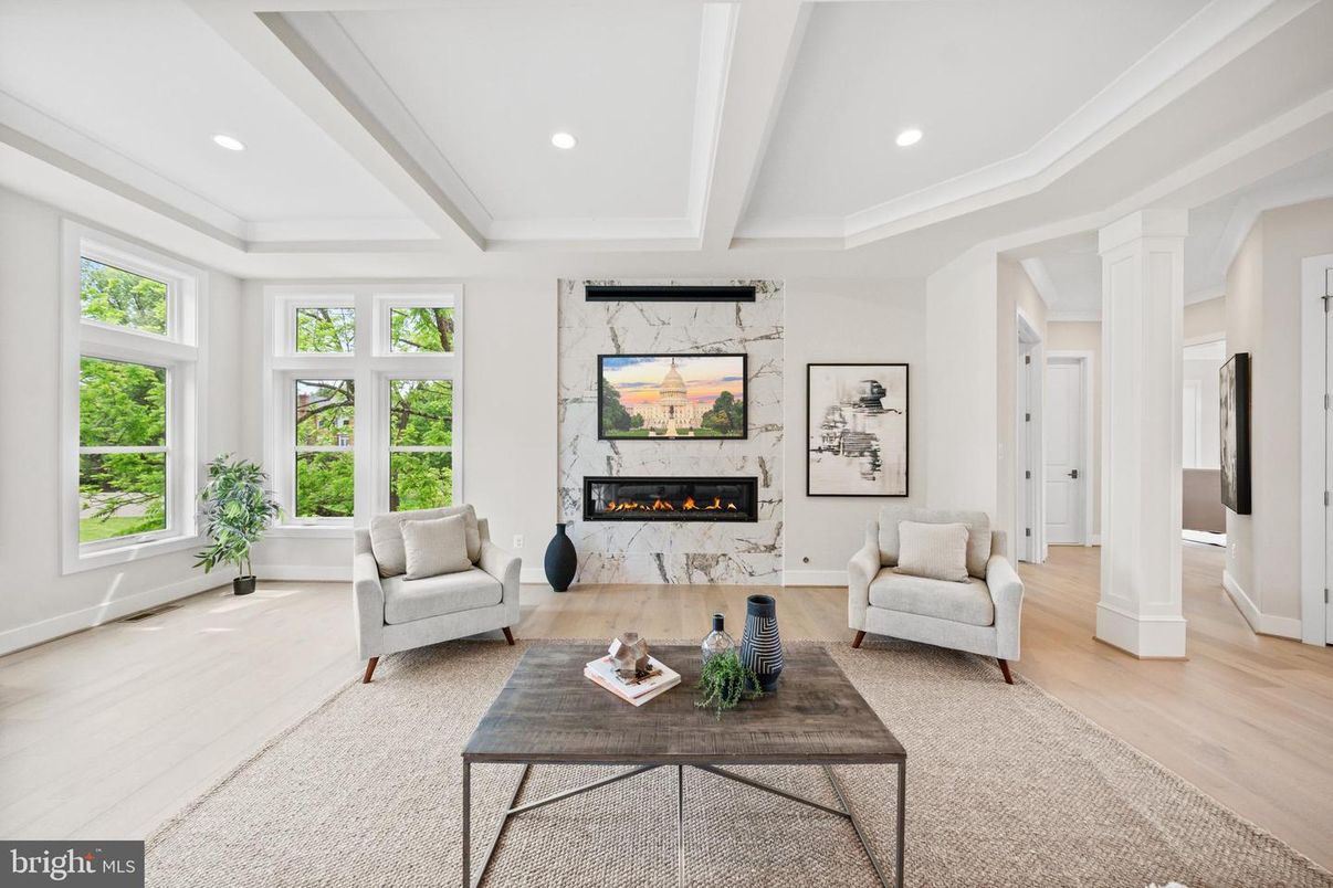 Fireplace, Interior, Living room, Marble Walls, Recessed Lighting, Wood Texture Flooring