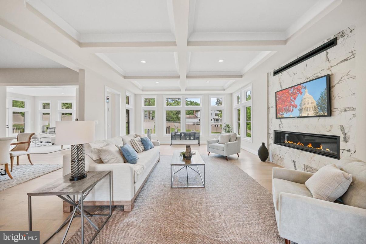 Fireplace, Interior, Living room, Marble Walls, Recessed Lighting, Wood Texture Flooring
