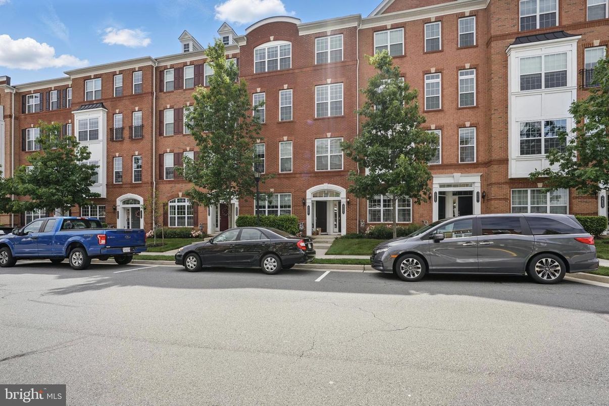 Exterior, Facade, Brick Facade, Condo Building