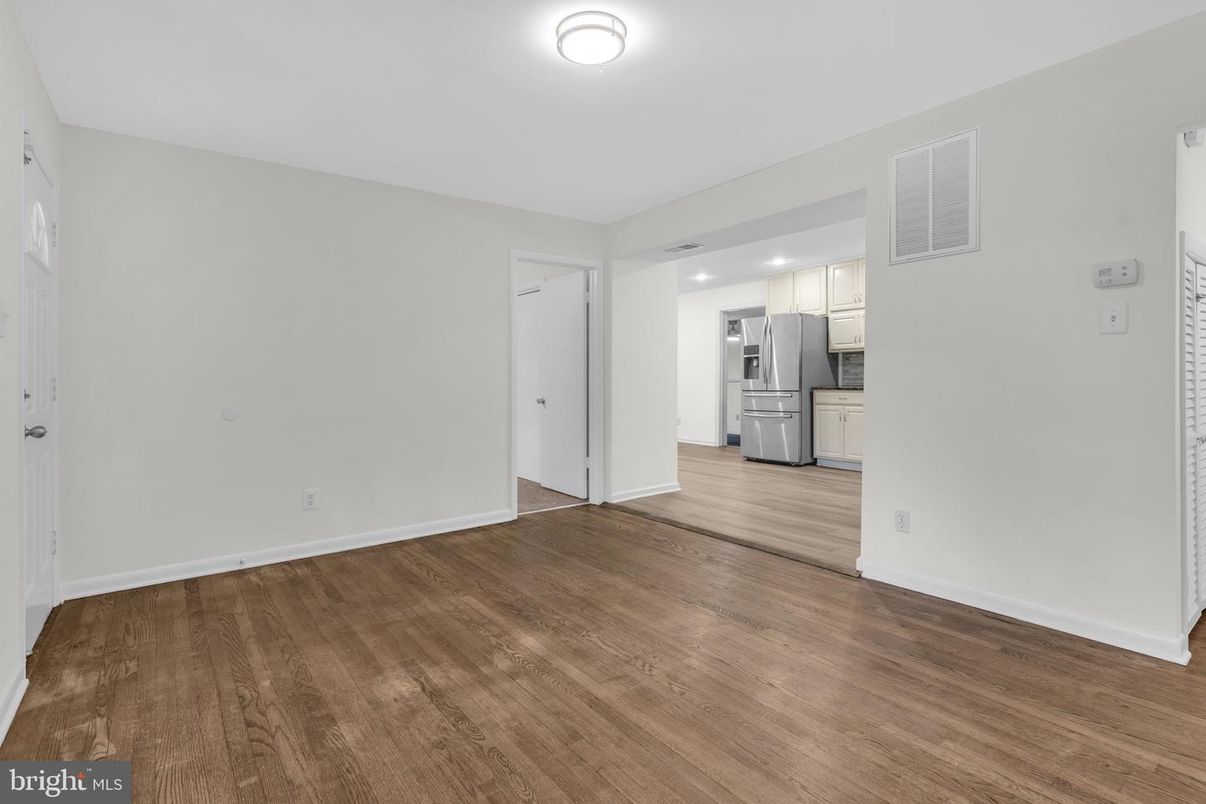 Empty room, Interior, Kitchen, Stainless Steel Appliances, Wood Texture Flooring