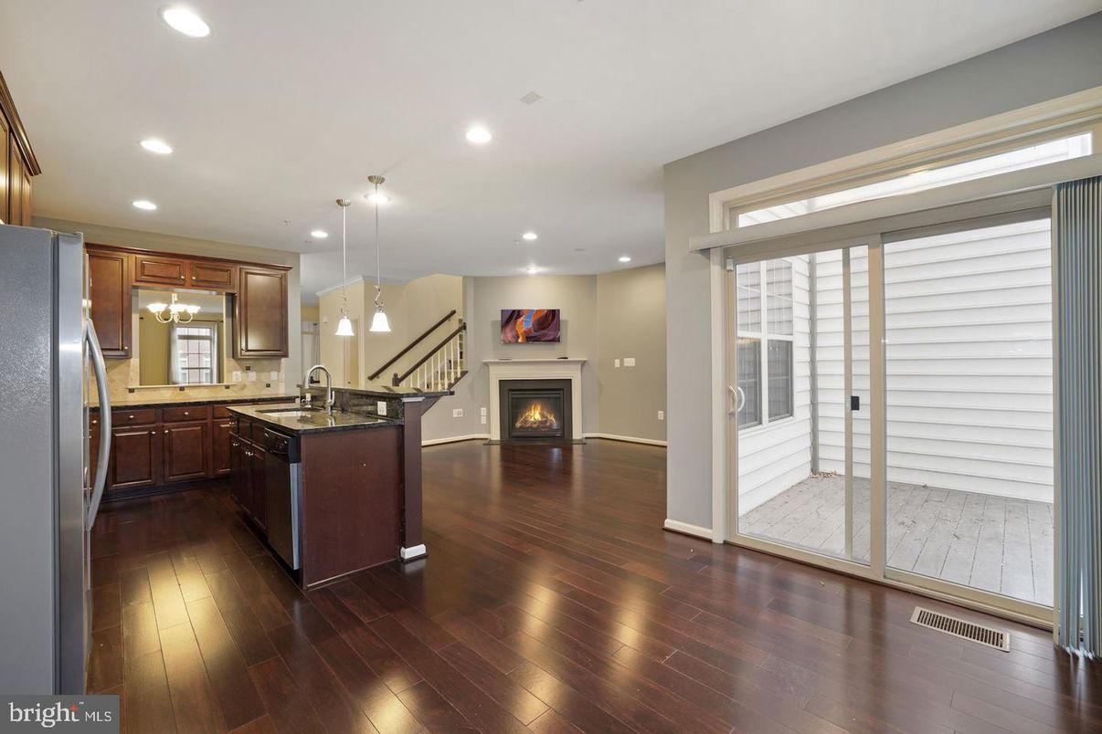 Fireplace, Interior, Kitchen, Pendant Lights, Recessed Lighting, Wood Texture Flooring