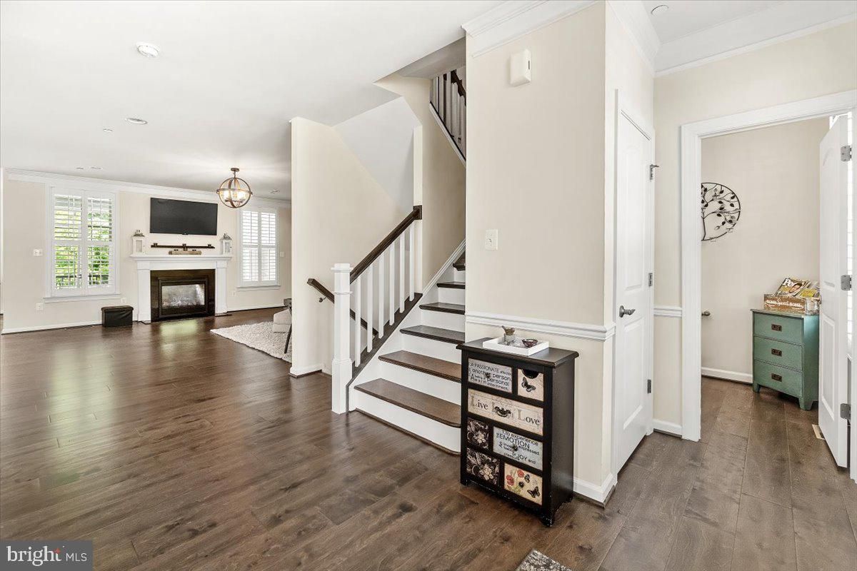 Chandelier, Fireplace, Interior, Recessed Lighting, Wood Texture Flooring