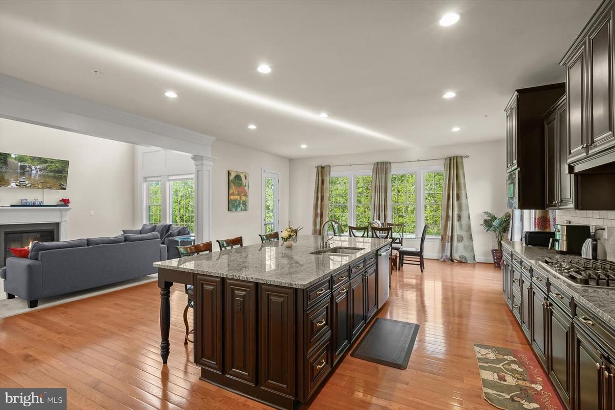 Dining room, Fireplace, Interior, Kitchen, Living room, Recessed Lighting, Wood Texture Flooring