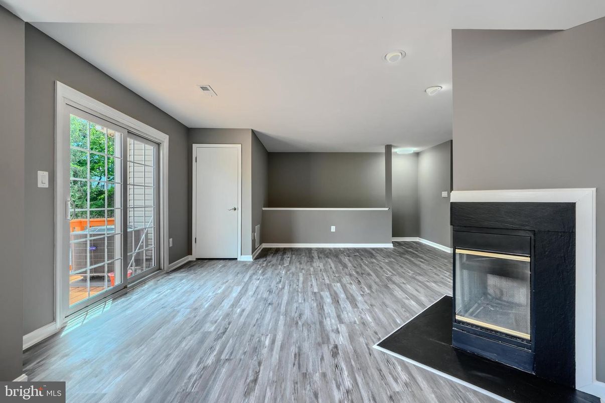 Empty room, Fireplace, Interior, Recessed Lighting, Wood Texture Flooring