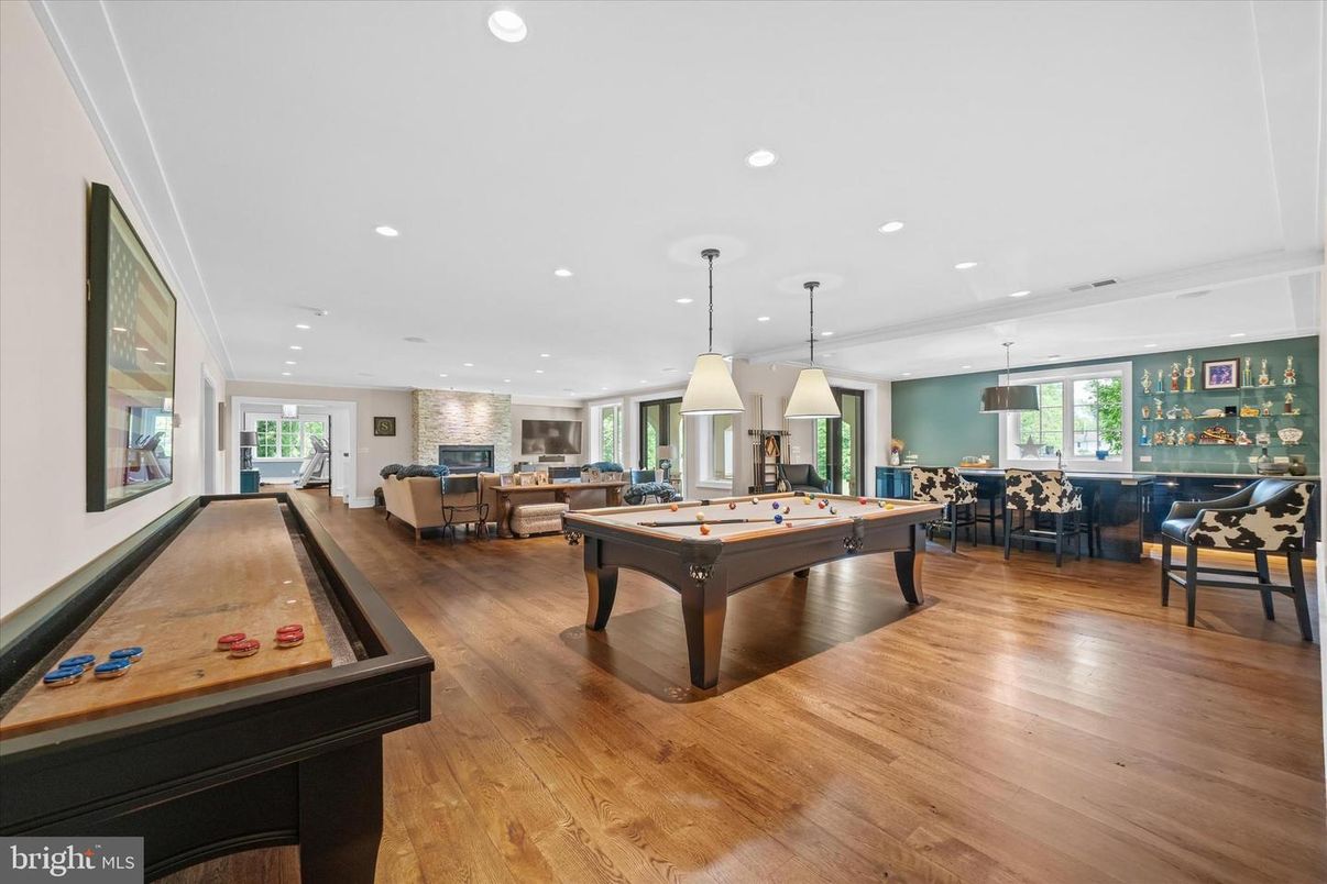 Billiard Table, Dining room, Fireplace, Game Room, Interior, Living room, Pendant Lights, Recessed Lighting, Wood Texture Flooring