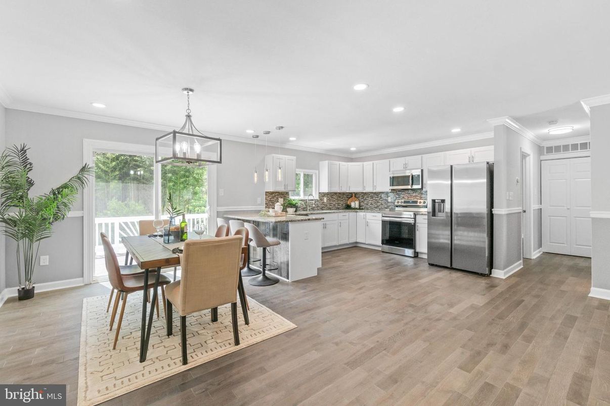 Dining room, Interior, Kitchen, Pendant Lights, Recessed Lighting, Stainless Steel Appliances, Wood Texture Flooring