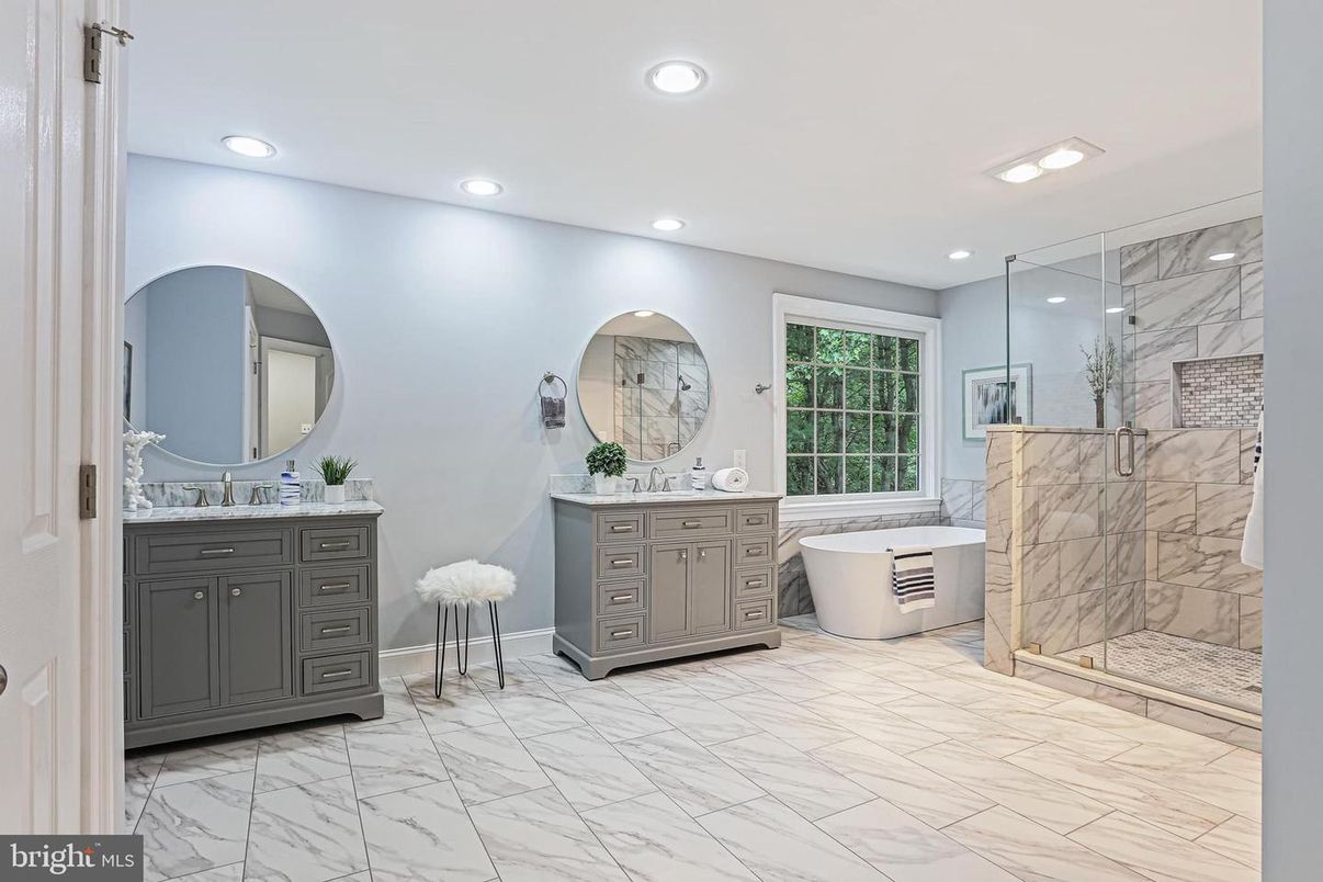 Bathroom, Dual Sink Vanities, Free Standing Baths, Glass Shower, Interior, Marble, Marble Walls, Recessed Lighting