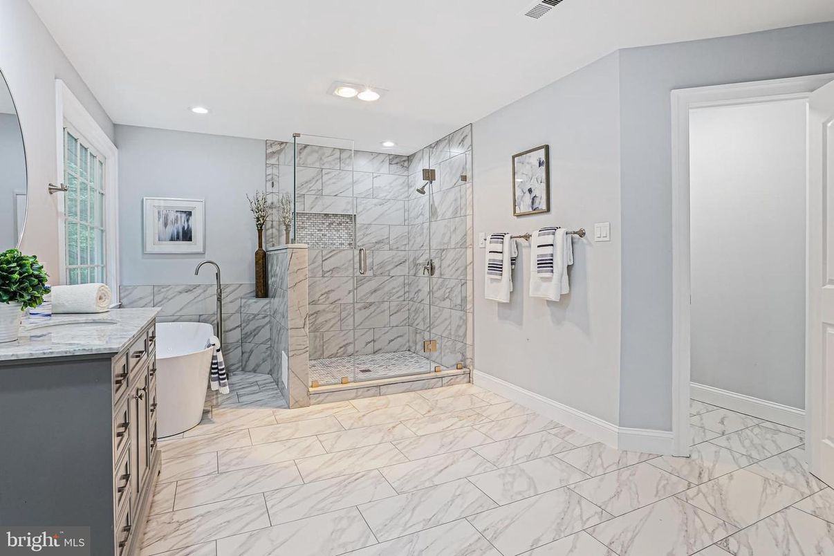 Bathroom, Free Standing Baths, Glass Shower, Interior, Marble, Marble Walls, Recessed Lighting