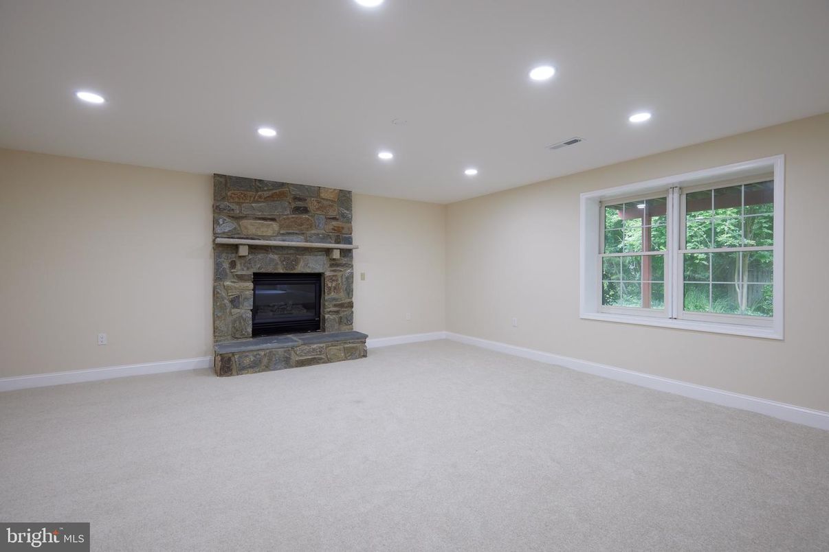 Empty room, Fireplace, Interior, Recessed Lighting, Stone Walls