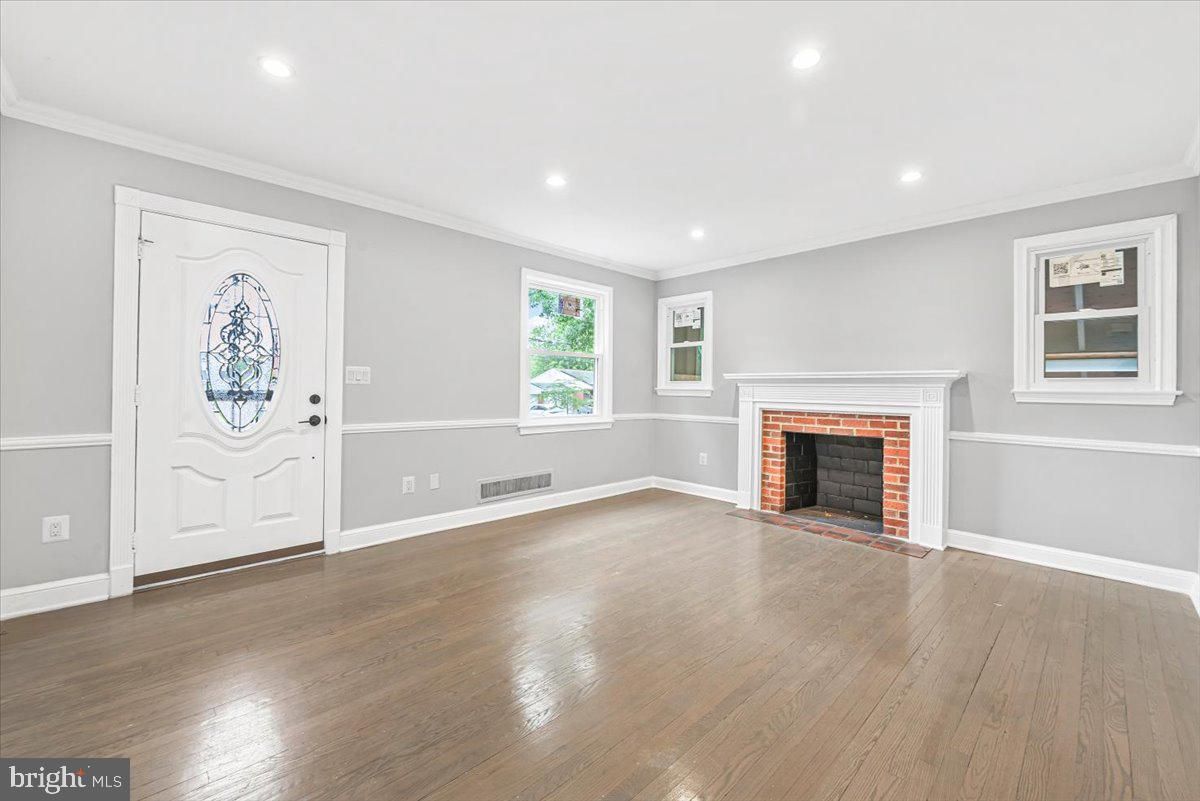 Empty room, Fireplace, Interior, Recessed Lighting, Wood Texture Flooring