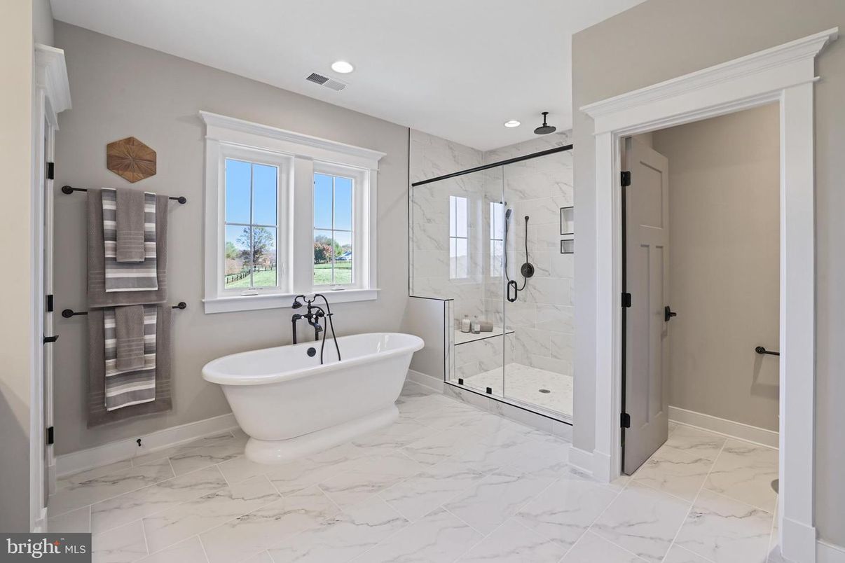 Bathroom, Free Standing Baths, Glass Shower, Interior, Marble, Marble Walls, Recessed Lighting