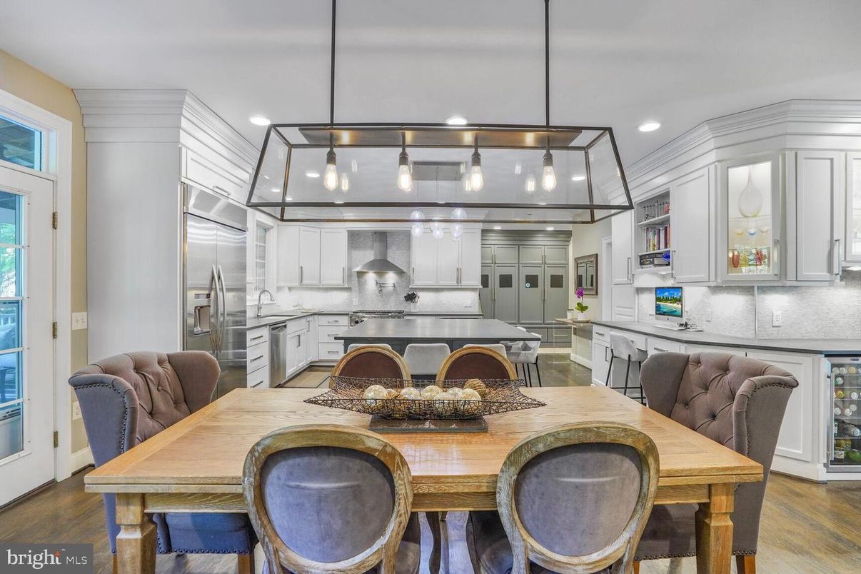 Dining room, Interior, Kitchen, Pendant Lights, Recessed Lighting, Stainless Steel Appliances, Wood Texture Flooring