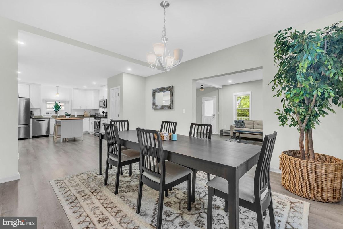 Dining room, Interior, Kitchen, Pendant Lights, Recessed Lighting, Stainless Steel Appliances, Wood Texture Flooring