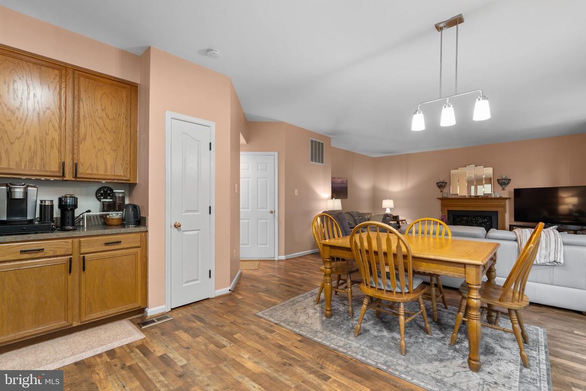Dining room, Fireplace, Interior, Pendant Lights, Wood Texture Flooring