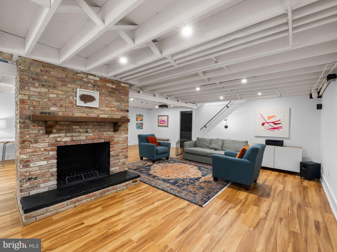 Fireplace, Interior, Living room, Recessed Lighting, Stone Walls, Wood Texture Flooring