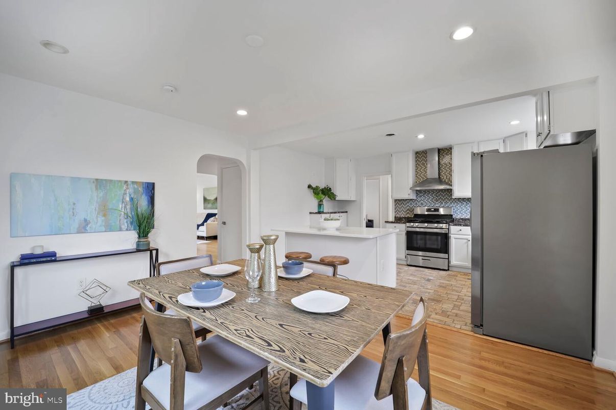 Dining room, Interior, Kitchen, Recessed Lighting, Stainless Steel Appliances, Wood Texture Flooring
