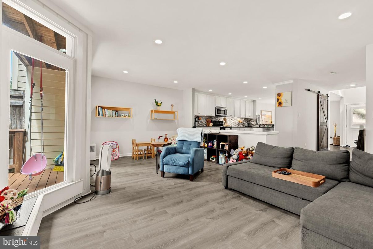 Dining room, Interior, Kitchen, Living room, Recessed Lighting, Stainless Steel Appliances, Wood Texture Flooring