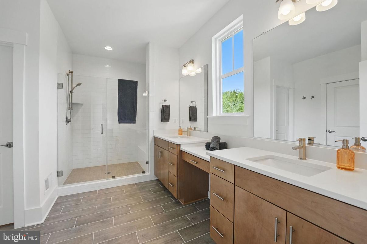 Bathroom, Dual Sink Vanities, Glass Shower, Interior, Recessed Lighting, Wood Texture Flooring