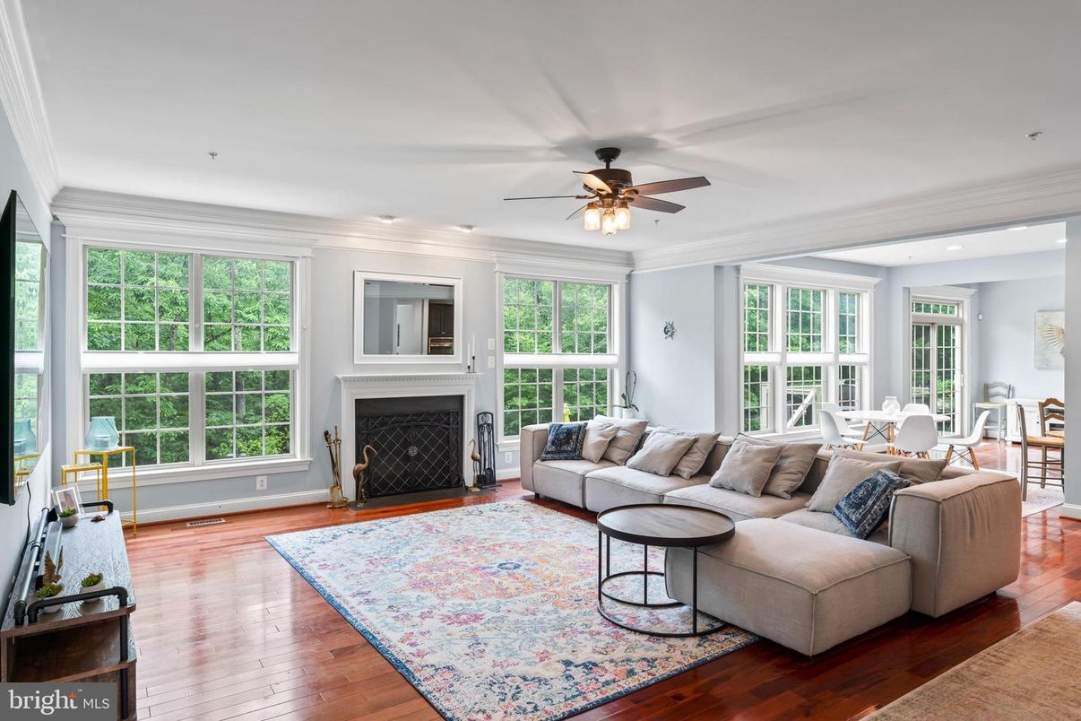 Dining room, Fireplace, Interior, Living room, Recessed Lighting, Wood Texture Flooring