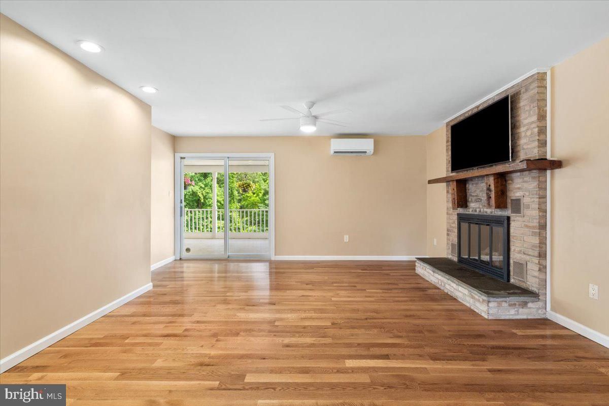 Empty room, Fireplace, Interior, Recessed Lighting, Wood Texture Flooring